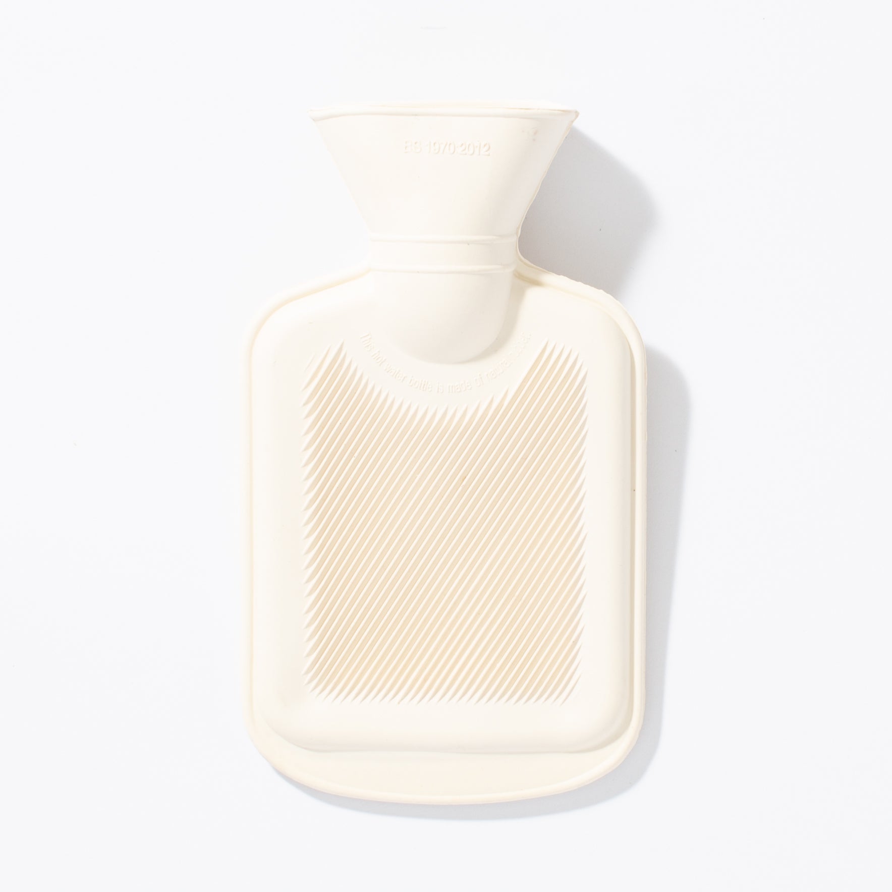 white mini hot water bottle